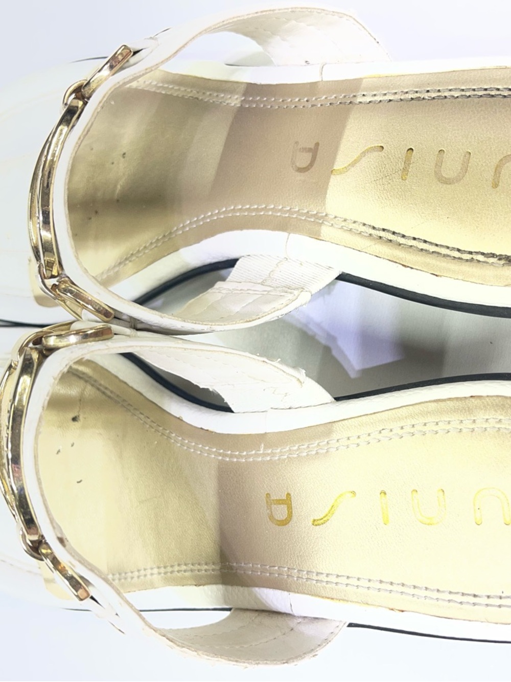 Unisa brand white mules featuring a gold-tone metal detail. - Picture 3 of 6